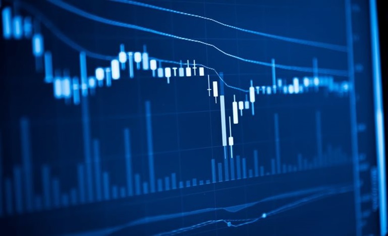 a chart on a screen showing ups and downs