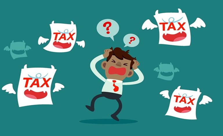 cartoon of frustrated man surrounded by tax demons